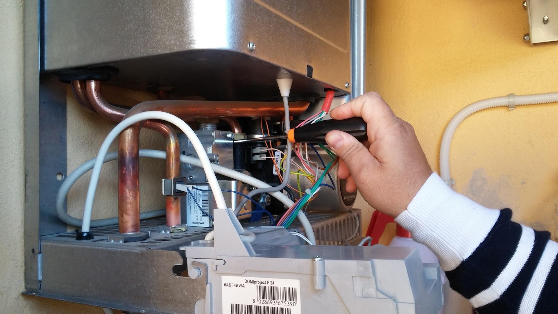 Heating engineer diagnosing boiler circulation issues in Norbury